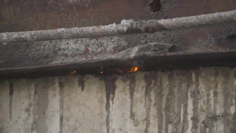 Closeup-Slow-motion-shot-of-sparks-coming-out-of-welding-on-an-under-construction-bridge