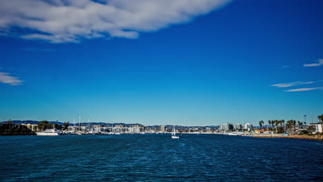 Time-lapse-of-boats-at-the-Marina-del-rey-and-the-Venice-beach,-sunny-Los-Angeles