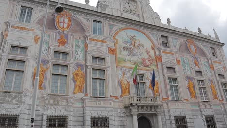 Panning-down-shot-of-exterior-of-Palazzo-San-Giorgio,-Genoa,-Italy