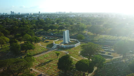 Drone-approaching-the-Manila-memorial-park---Sucat,-in-Parañaque,-Philippines