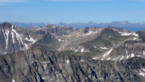 Top-of-summit-view-Quandary-Peak-Breckenridge-Kenosha-Pass-fourteener-14er-June-July-Summer-Colorado-blue-sky-Rocky-Mountain-landscape-snow-melting-Continental-Divide-Grays-and-Torreys-early-morning