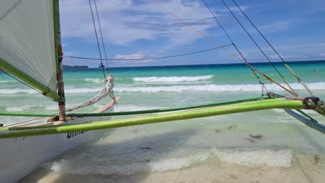 Catamaran-Boat-on-White-Beach,-Boracay-Island,-Philippines,-Exotic-Travel-Destination-60fps