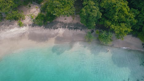 Aerial-Drone-Flyover-Beautiful-Penca-Beach-Blue-Ocean-Water,-4K-Costa-Rica