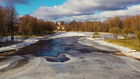 "Krācītes"-in-Valmiera,-Latvia---Fast-rushing-flow-in-river-Gauja-on-sunny-spring-day