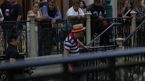 Gondolier-In-Traditional-Costume-With-Crowd-Of-People