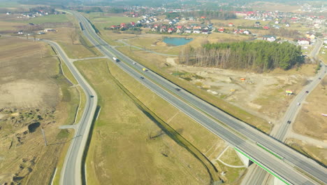 Aerial-view-of-a-highway-with-surrounding-greenery