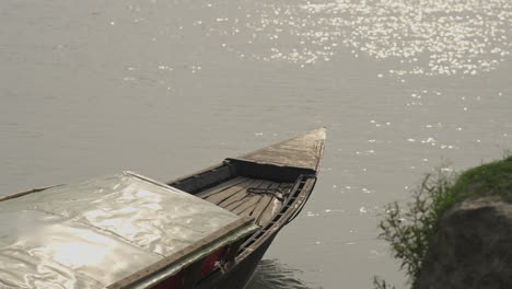 Motor-driven-boat-moving-across-the-river-of-Bangladesh