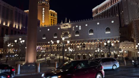 Nightlife-in-front-of-The-Venetian-Las-Vegas-with-a-captivating-tilt-down-camera-shot