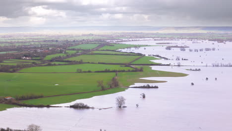 Panoramic-aerial-view-of-flooded-Somerset-rural-landscape-after-severe-rainfall