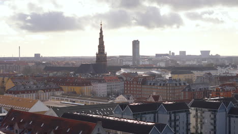 Copenhagen-skyline-aerial-trucking-view-with-prominent-Church-of-Our-Saviour