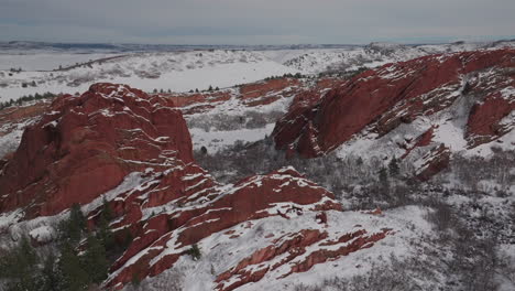 Fresh-snow-sunny-bluesky-Roxborogh-State-Park-Golf-Course-aerial-drone-Colorado-Front-Range-winter-spring-deep-powder-dramatic-sharp-pointy-red-rocks-mountain-landscape-Littleton-Denver-circle-left