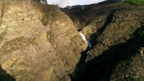 A-Tropical-Waterfall-in-a-Mountain-Canyon