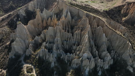 Close-up-aerial-view-of-Omarama-Clay-Cliffs-on-South-Island,-New-Zealand