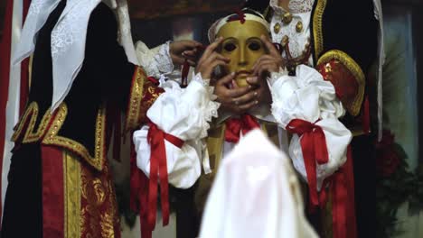 Ritual-dressing-of-Su-Composidori,-Sartiglia-feast,-Oristano,-Sardinia,-Italy,-Europe-Mask-dressing-up