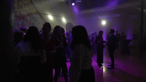 Lively-party-with-disco-ball-and-purple-lights