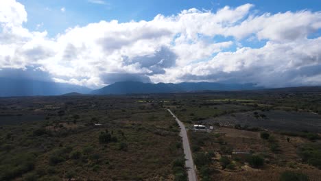 Lonely-road-and-crop-fields-in-El-Conde,-San-Pedro-Lagunillas,-Nayarit,-Mexico