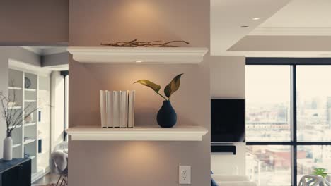 panning-shot-of-a-shelf-with-modern-decorations-in-the-living-room-of-a-open-concept-condominium