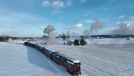 Aerial-shot-of-a-train-in-rural-farmland