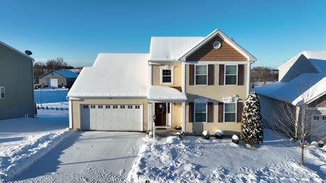 Aerial-approaching-shot-of-american-House-in-suburb-district-at-sun