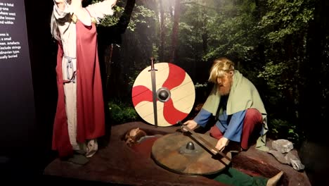 Exposition-of-statues-representing-Viking-Burials-in-Dublinia-Museum,-Ireland