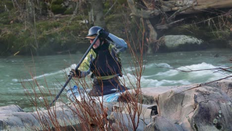 Closeup-of-kayaker-paddling-in-river