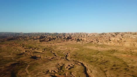 Wide-panoramic-landscape-of-desert-nature-in-summer-season-in-middle-east-north-America-a-wind-erosion-geology-concept-of-attraction-travel-to-scenic-wonderful-natural-hiking-region-in-hot-dry-climate
