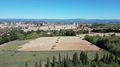 Carcassonne-Fortified-City-Walls-and-Medieval-Old-Town-in-France---Aerial-4k