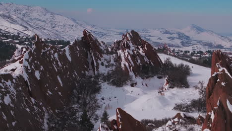 Fresh-snow-sunny-afternoon-Roxborogh-State-Park-Golf-Course-aerial-drone-Colorado-Front-Range-winter-spring-deep-powder-dramatic-sharp-red-rocks-mountain-landscape-Littleton-Denver-circle-right-motion