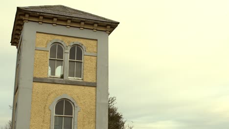 Tilt-up-shot-of-iconic-Fisheries-Tower-in-Galway-City-centre,-Ireland