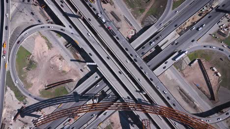 Construction-resumes-along-an-overpass-with-steel-beams-and-concrete-pillars