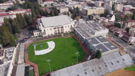Aerial-View-of-Stu-Gordon-Stadium,-Ballpark-in-University-of-California-Berkeley-Campus,-Revealing-Drone-Shot