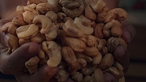 Handful-of-delicious-cashew-nuts-.-Slow-motion