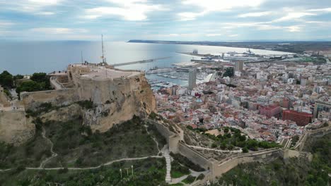 Alicante-Castle,-City-and-Port-at-Costa-Blanca,-Spain---Aerial-4k