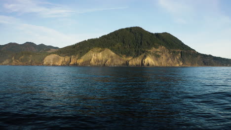 Rugged-cliff,-mountain-peak-on-Oregon-coast,-view-from-Pacific-Ocean
