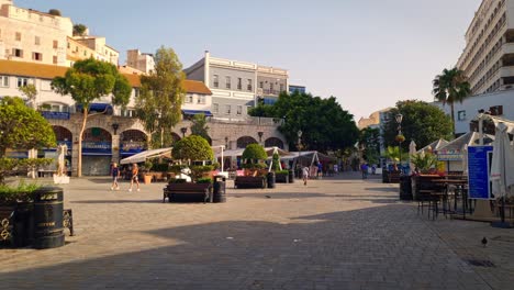 Shot-of-downtown-during-afternoon-with-tourists-in-Gibraltar