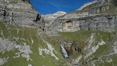 Waterfall-in-Ordesa-and-Monte-Perdido-National-Park,-Pyrenees,-North-Spain---Aerial-4k