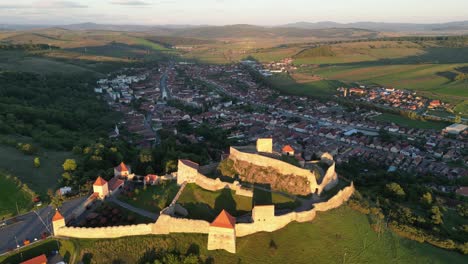 Rupea-Fortress-and-Town-in-Transylvania,-Romania---Aerial-4k