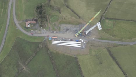 Wind-turbine-construction-in-green-irish-countryside,-monaghan,-aerial-view