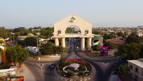 Aerial-view-of-stunning-Arch-22-entry-portal-to-Banjul,-Gambia