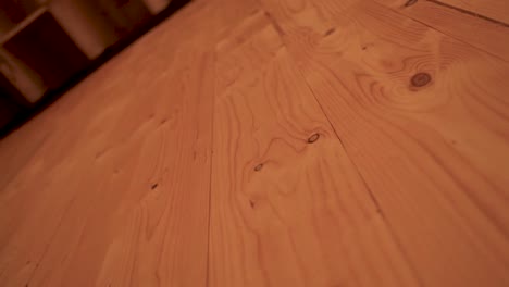 Warm-toned-wooden-floorboards-with-a-soft-focus-background-and-natural-patterns