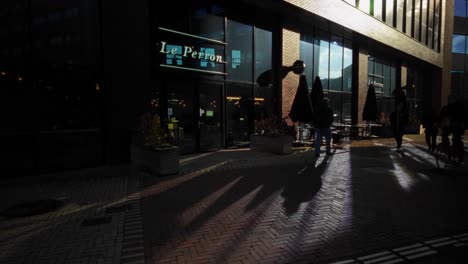 Outdoors-of-modern-and-new-bar-cafe-restaurant-in-sunlight-with-reflection-in-window