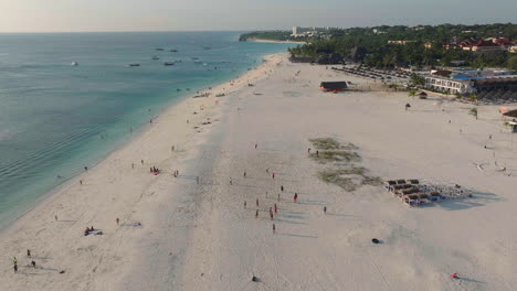 Top-view-from-drone-of-sea-white-sand-and-palm-trees