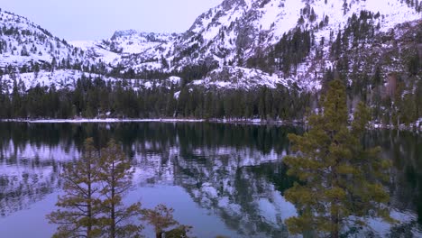 Aerial-reveal-of-snowy-mountains-in-Emerald-Bay,-Lake-Tahoe,-California,-Desolation-Wilderness