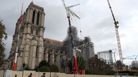 Construction-Crane-And-Scaffoldings-At-Notre-Dame-de-Paris-Cathedral-Under-Reconstruction-In-Paris,-France