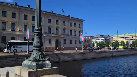 Downtown-Gothenburg,-Sweden,-Traffic,-River-Canal-and-Buildings-on-Sunny-Summer-Day