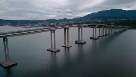 Forward-aerial-shot-of-a-bridge-in-Tasmania,-Australia