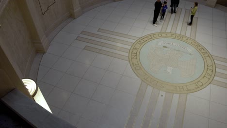 People-inside-New-Mexico-capitol-building-in-Santa-Fe,-New-Mexico