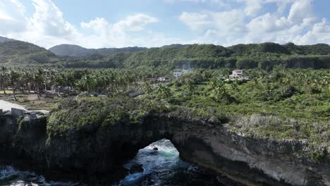 Aerial-view-over-the-Hondonada-natural-arch,-on-the-coast-of-Las-Galeras,-Saman?