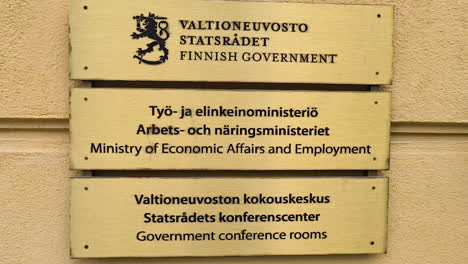 Finnish-Ministry-of-Economic-Affairs-and-Employment,-Sign-Board-on-Government-Building-in-Helsinki,-Finland,-Close-Up