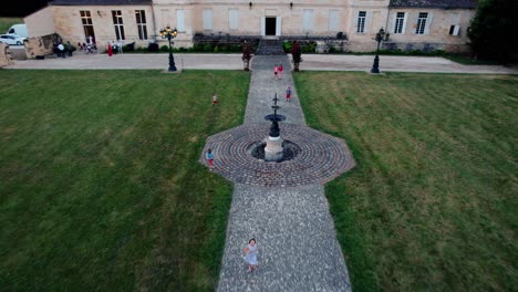 Enchanting-Sunset-Play:-Children's-Delight-in-the-Castle-Garden